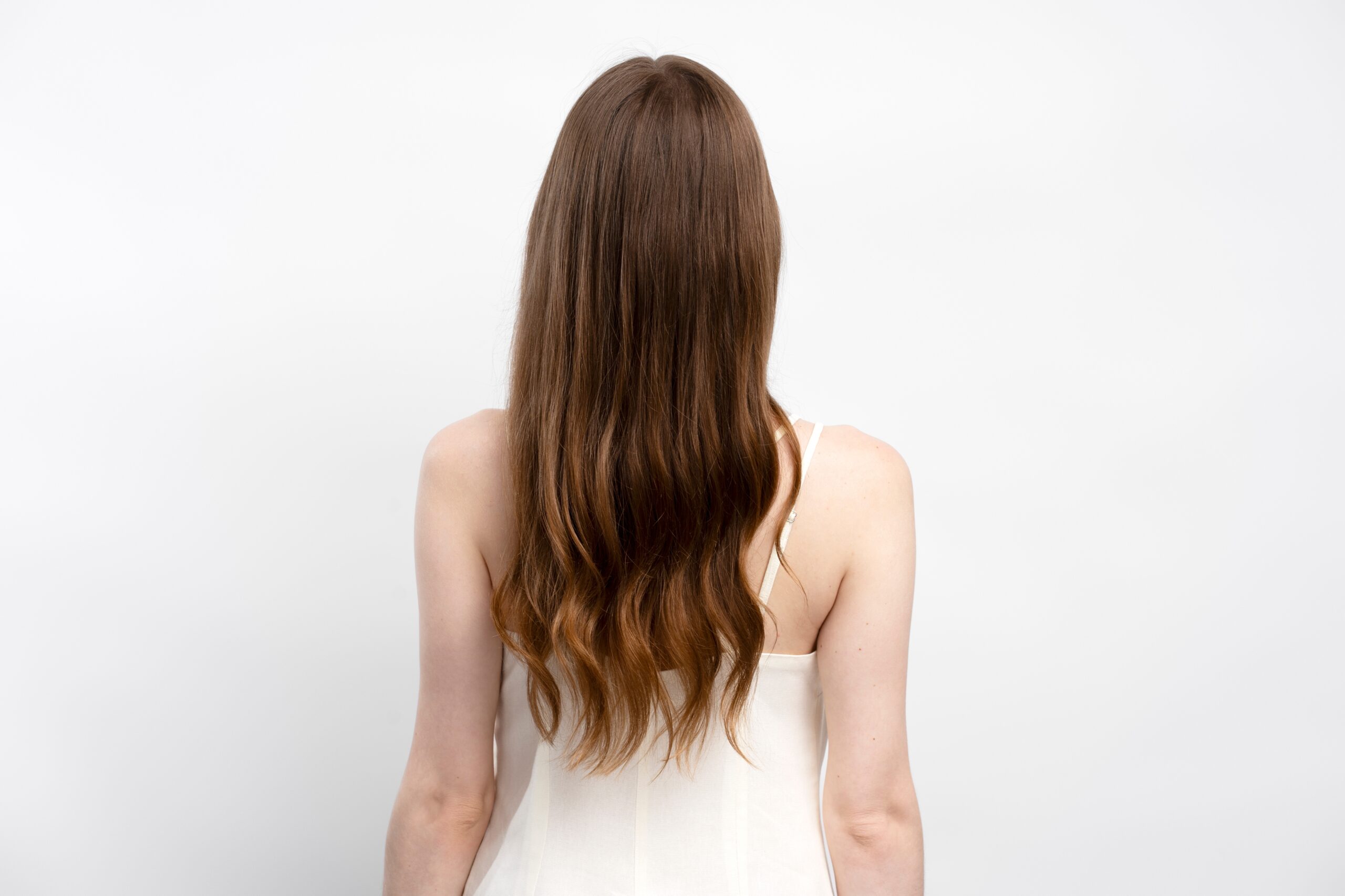Back,View,Of,Attractive,Brunette,Woman,With,Healthy,Long,Hair Back,View,Of,Attractive,Brunette,Woman,With,Healthy,Long,Hair